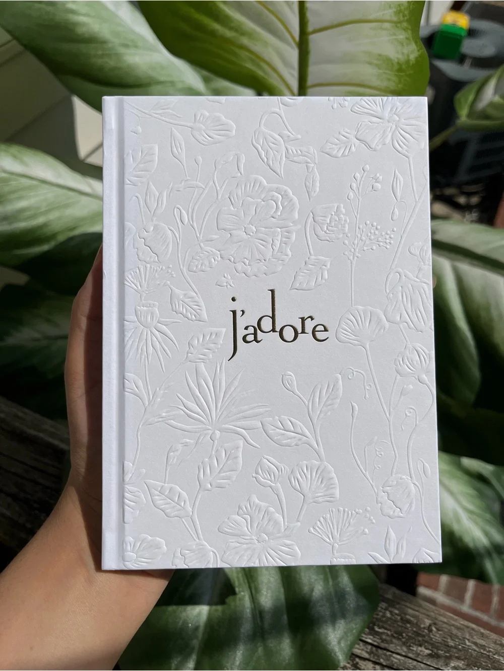 Dior white notebook